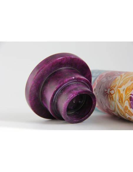 Round colourful incense tower with engraved flowers
