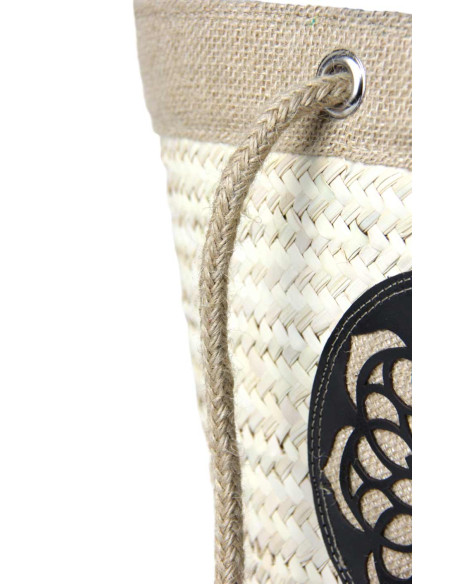 Wicker basket bag with black leather rosette