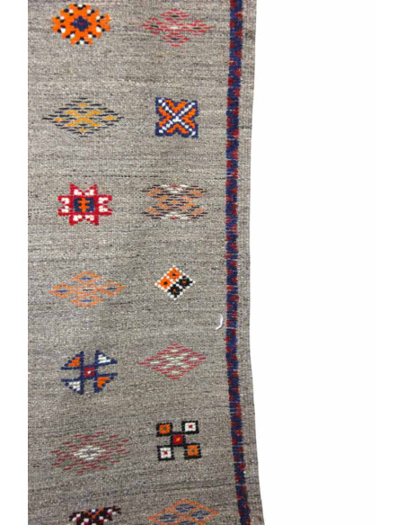 Wool rug in grey with purple border and scattered motifs, 40 x 60 in