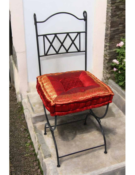 Wrought iron chair with burgundy cushion