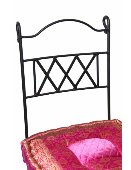 Wrought iron chair with fuchsia cushion