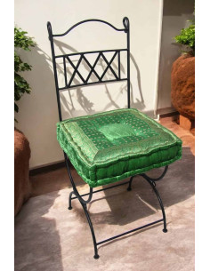 Wrought iron chair with green cushion 2
