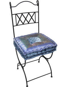 Wrought iron chair with lavender blue cushion