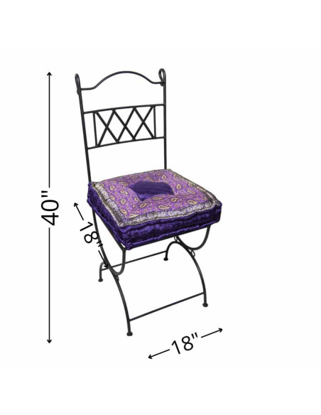 Wrought iron chair with purple cushion
