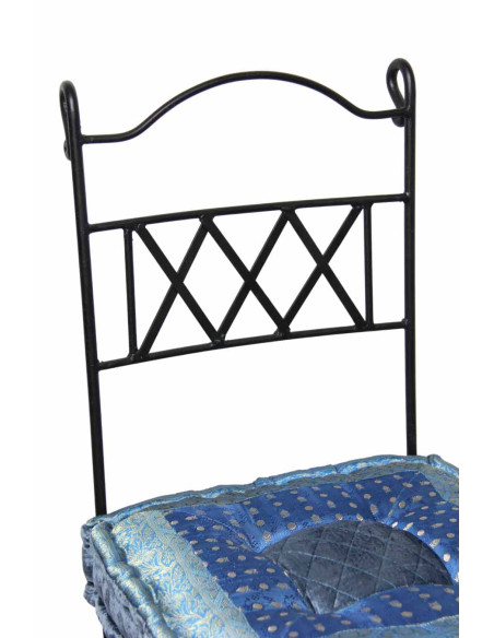 Wrought iron chair with sky blue cushion