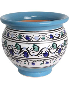 Sky blue ceramic planter with blue and green leaves